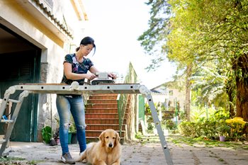 Woman working on a home improvement project.